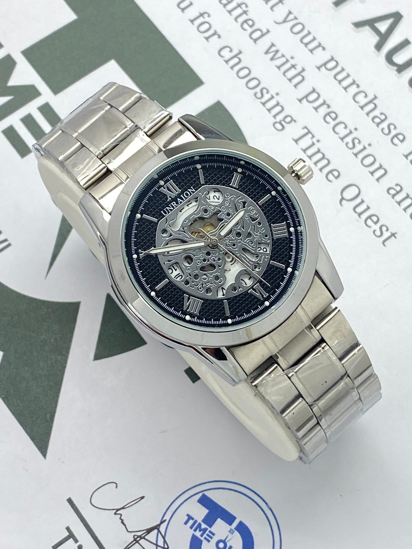 UNRAION Analog Skeleton Dial Stainless Steel Chain Watch for Men with Quartz Movement Date Display